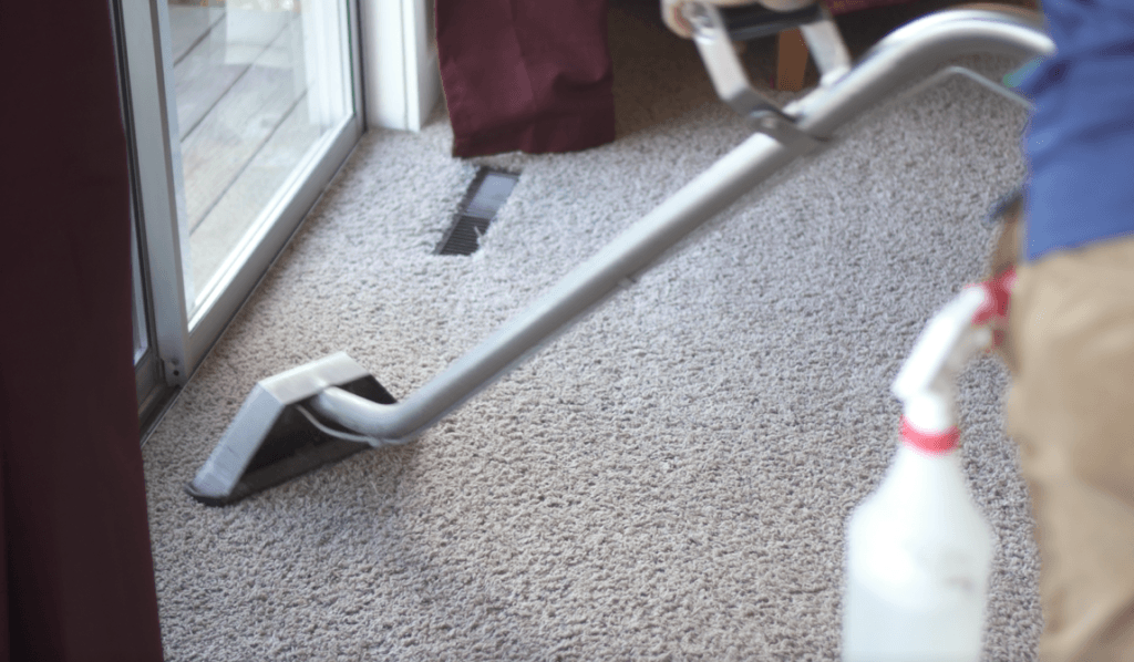 A Carpet being Cleaned. Sideview.